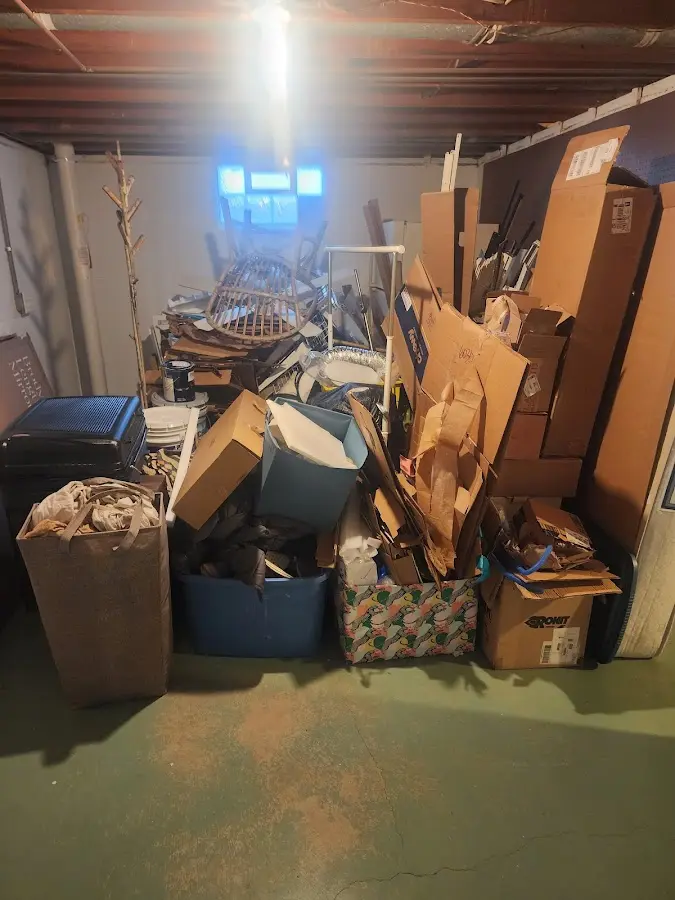 Roll-off dumpster container at job site for 15 Yard Dumpster Rental in Azle